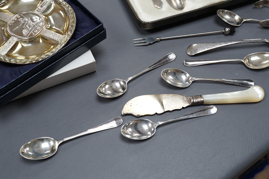 A collection silver to include a modern commemorative Britannia standard dish, cased, a cased set of six George VI teaspoons and other sundry flatware.